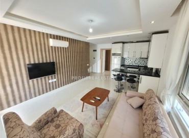 Furnished apartment 1+1, 55m², in the center of Alanya in a modern house with a swimming pool, 350m from the sea ID-16070 фото-4