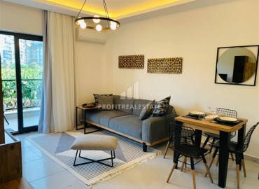 Эргономичная стильная квартира 1+1, с мебелью, по привлекательной цене, в 350 метрах от моря, Махмутлар, Аланья ID-16072 фото-1