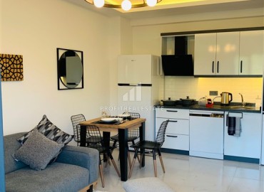 Эргономичная стильная квартира 1+1, с мебелью, по привлекательной цене, в 350 метрах от моря, Махмутлар, Аланья ID-16072 фото-4