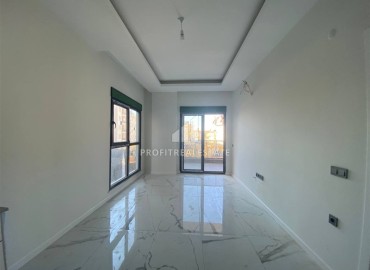 Новая квартира с двумя спальнями, 85м², в новостройке с бассейном, в 400м от моря в районе Тосмур, Алания ID-16076 фото-5