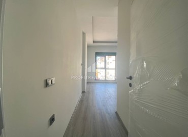 Новая квартира с двумя спальнями, 85м², в новостройке с бассейном, в 400м от моря в районе Тосмур, Алания ID-16076 фото-9