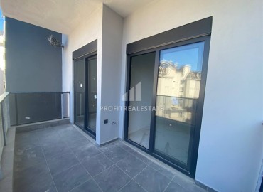 Новая квартира с двумя спальнями, 85м², в новостройке с бассейном, в 400м от моря в районе Тосмур, Алания ID-16076 фото-14