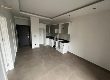 New apartment at an attractive price, 1+1, 50m², unfurnished, in a new building with extensive facilities, Oba, Alanya ID-16084 фото-3