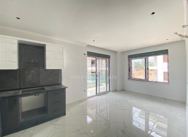 Inexpensive one bedroom apartment in a new building, unfurnished, with fine finishing and a built-in kitchen, Oba, Alanya ID-16089 фото-3