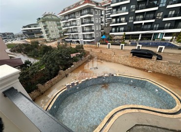 One bedroom apartment, 55m², in a residence with a swimming pool in the final stage of construction in Oba, Alanya ID-16018 фото-9