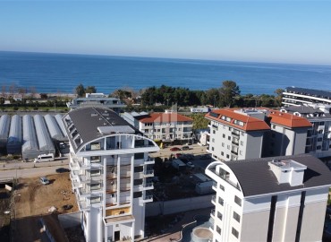 Апартаменты 1+1, 55м², в премиум-комплексе на окончательном этапе строительства, в 100м от моря в районе Каргыджак, Алания ID-16109 фото-2
