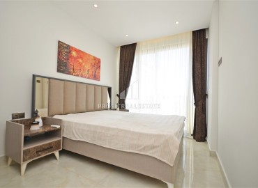 One-bedroom apartment, 60 m², in a premium residence on the first coastline in Mahmutlar, Alanya. ID-16112 фото-9