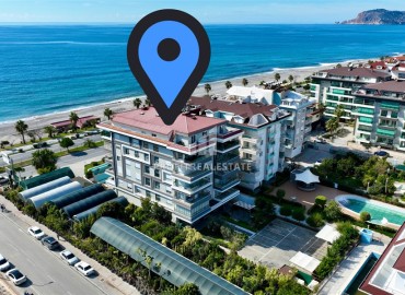Apartment 1+1 with mountain views, 72m², with an elegant interior on the first coastline in Kestel, Alanya ID-16132 фото-2