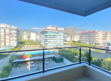 Apartment 1+1 with mountain views, 72m², with an elegant interior on the first coastline in Kestel, Alanya ID-16132 фото-12