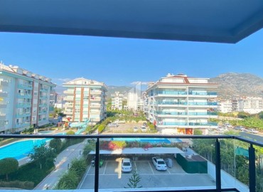 Apartment 1+1 with mountain views, 72m², with an elegant interior on the first coastline in Kestel, Alanya ID-16132 фото-16