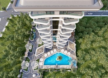 Новая квартира с двумя спальнями, 85м², в комплексе на этапе строительства в центре Махмутлара, в 400м от моря ID-16135 фото-4