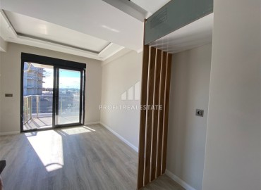 Inexpensive one-bedroom unfurnished apartment 40 m², in a new building with a swimming pool, 500 meters from the sea, Gazipasa, Alanya ID-16140 фото-2