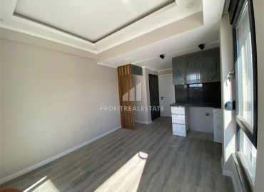 Inexpensive one-bedroom unfurnished apartment 40 m², in a new building with a swimming pool, 500 meters from the sea, Gazipasa, Alanya ID-16140 фото-3