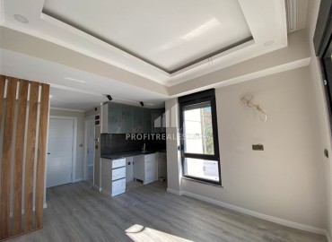 Inexpensive one-bedroom unfurnished apartment 40 m², in a new building with a swimming pool, 500 meters from the sea, Gazipasa, Alanya ID-16140 фото-4
