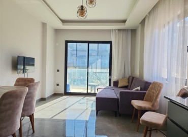 Stylish one-bedroom apartment, 48m², in a cozy residence at the foot of the mountains in Oba, Alanya. ID-16144 фото-3