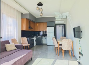 Stylish one-bedroom apartment, 48m², in a cozy residence at the foot of the mountains in Oba, Alanya. ID-16144 фото-4