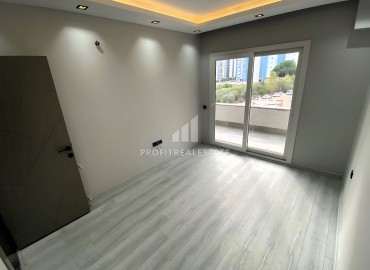 One bedroom apartment, 75m², in a residence with extensive facilities under construction in Erdemli, Arpacbakhsis ID-16146 фото-12