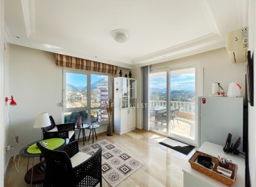 Stylish bright penthouse 4+1, for a residence permit, overlooking the Mediterranean Sea and mountains, with a glazed balcony, Tosmur, Alanya ID-16155 фото-17