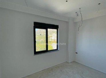 Новая квартира с одной спальней, 45м². в комплексе на этапе строительства в районе Махмутлар, Алания, по привлекательной цене ID-16159 фото-3