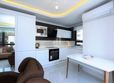 Luxurious two bedroom apartment with a stylish, bright interior, for a residence permit, in the center of Alanya ID-16188 фото-4