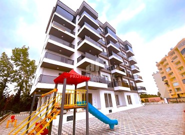 Two bedroom apartment, 110m², in a cozy new building with a swimming pool in Kargıpınarı, Mersin ID-16196 фото-1