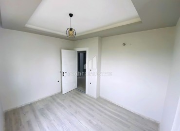 Квартира с двумя спальнями, 110м², в уютной новостройке с бассейном в Каргыпынары, Мерсин ID-16196 фото-9