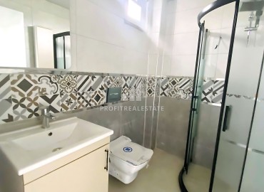 Квартира с двумя спальнями, 110м², в уютной новостройке с бассейном в Каргыпынары, Мерсин ID-16196 фото-13