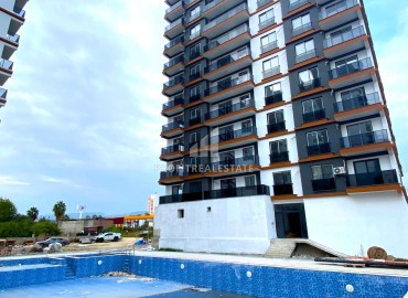 Stylish one-bedroom apartment, 55m², in a new building with extensive facilities in Erdemli, Arpacbakhsis ID-16202 фото-1