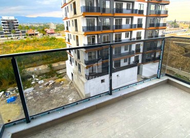 Стильная двухкомнатная квартира, 55м², в новостройке с обширной инфраструктурой в Эрдемли, Арпачбахшиш ID-16202 фото-11