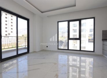 Great offer! Inexpensive new bright apartment 1+1, 55m², in a residence with facilities, Mahmutlar, Alanya ID-16204 фото-2