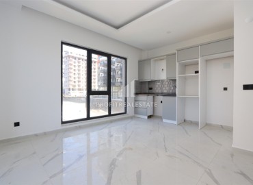 Great offer! Inexpensive new bright apartment 1+1, 55m², in a residence with facilities, Mahmutlar, Alanya ID-16204 фото-3