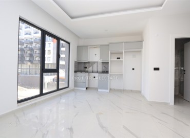 Great offer! Inexpensive new bright apartment 1+1, 55m², in a residence with facilities, Mahmutlar, Alanya ID-16204 фото-4