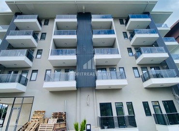 Двухкомнатная квартира, 50м², в новом комплексе на окончательном этапе строительства в Махмутларе, Алания ID-16221 фото-1