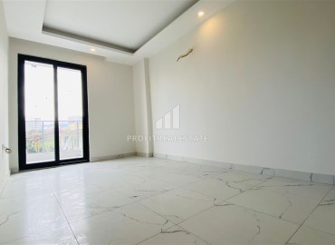 Двухкомнатная квартира, 50м², в новом комплексе на окончательном этапе строительства в Махмутларе, Алания ID-16221 фото-4