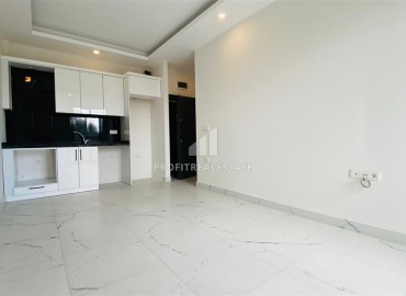 Двухкомнатная квартира, 50м², в новом комплексе на окончательном этапе строительства в Махмутларе, Алания ID-16221 фото-5