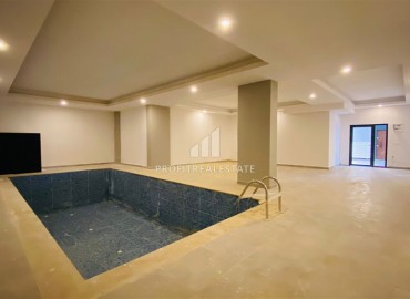 Двухкомнатная квартира, 50м², в новом комплексе на окончательном этапе строительства в Махмутларе, Алания ID-16221 фото-19