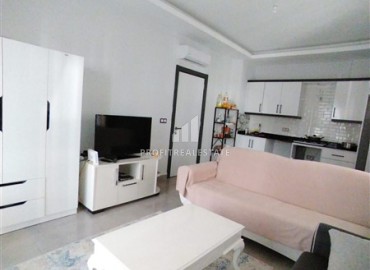 Elegant furnished 1+1 apartment at an attractive price, in a residence with facilities, Mahmutlar, Alanya ID-16225 фото-3
