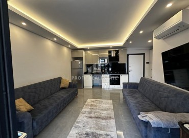 Great offer! Inexpensive stylishly furnished 1+1 apartment, 250 meters from the sea, Mahmutlar, Alanya ID-16226 фото-2