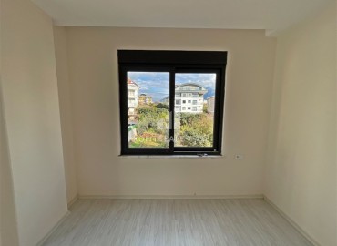 Inexpensive apartment 2+1, unfurnished, in a new building at the final stage of construction, Oba, Alanya ID-16227 фото-14