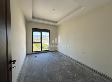 New apartment with two bedrooms, 90m². in a residence under construction in Mahmutlar, Alanya ID-16234 фото-4