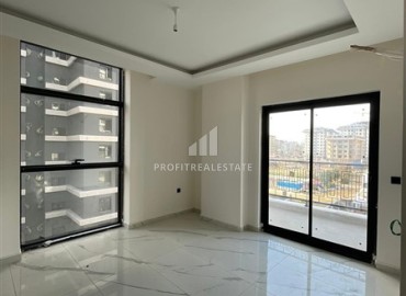 New 1+1 apartment at an attractive price, unfurnished, in a modern residence with facilities, Mahmutlar, Alanya ID-16237 фото-3