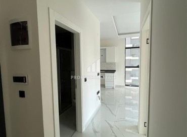 Новая квартира 1+1 по привлекательной цене, без мебели, в современной резиденции с инфраструктурой, Махмутлар, Аланья ID-16237 фото-6