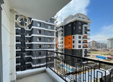 Новая квартира 1+1 по привлекательной цене, без мебели, в современной резиденции с инфраструктурой, Махмутлар, Аланья ID-16237 фото-9