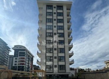 Недорогая двухкомнатная квартира без мебели 50м², в новостройке с инфраструктурой, Махмутлар, Аланья ID-16241 фото-1
