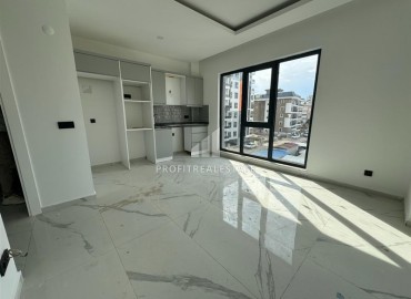 Inexpensive one bedroom apartment without furniture 50m², in a new building with facilities, Mahmutlar, Alanya ID-16241 фото-4