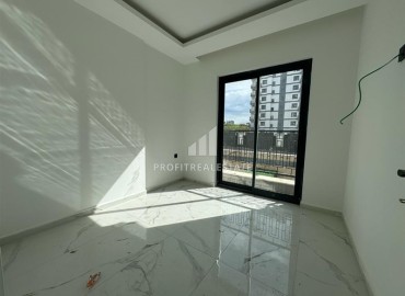 Недорогая двухкомнатная квартира без мебели 50м², в новостройке с инфраструктурой, Махмутлар, Аланья ID-16241 фото-10
