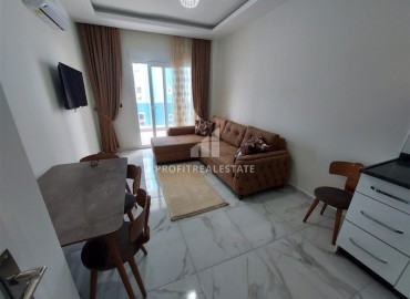 Hot offer! Inexpensive furnished one-bedroom apartment 500 meters from the sea, Mahmutlar, Alanya ID-16245 фото-2