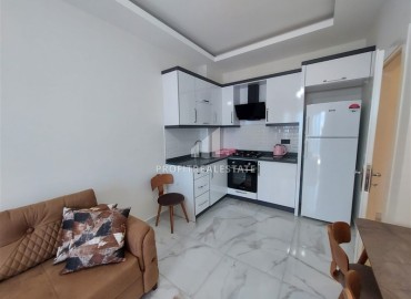 Hot offer! Inexpensive furnished one-bedroom apartment 500 meters from the sea, Mahmutlar, Alanya ID-16245 фото-4