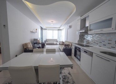 Elegant one-bedroom apartment, 65m², in an elite residence with an excellent location in the Tosmur area, Alanya. ID-16250 фото-4
