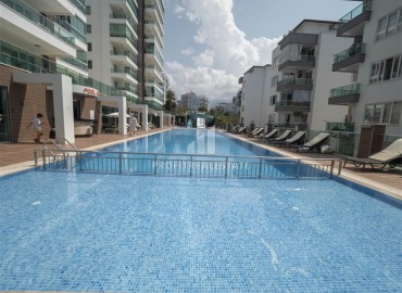 Elegant one-bedroom apartment, 65m², in an elite residence with an excellent location in the Tosmur area, Alanya. ID-16250 фото-19